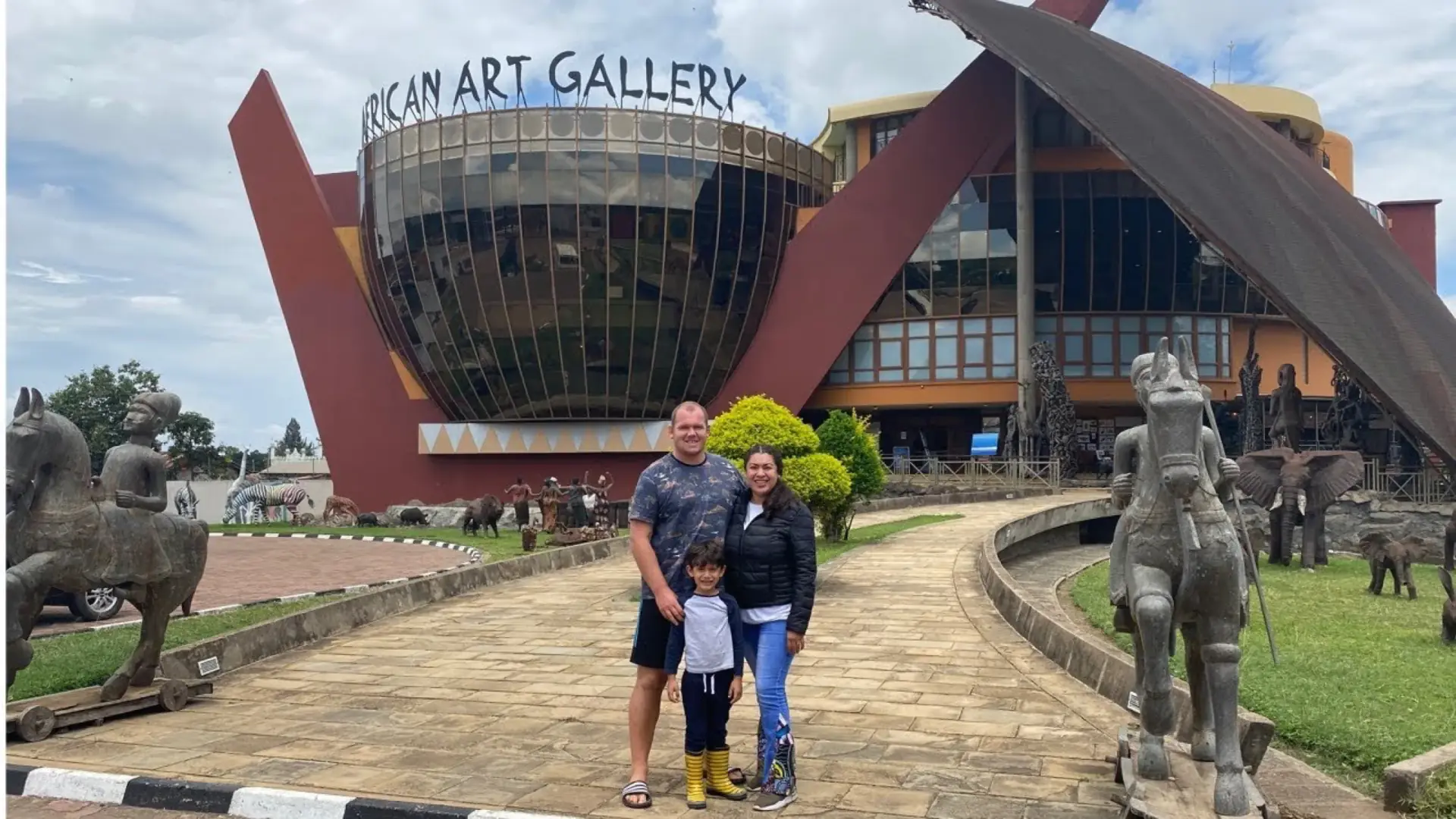 Family visiting the Cultural Heritage Centre art gallery in Arusha