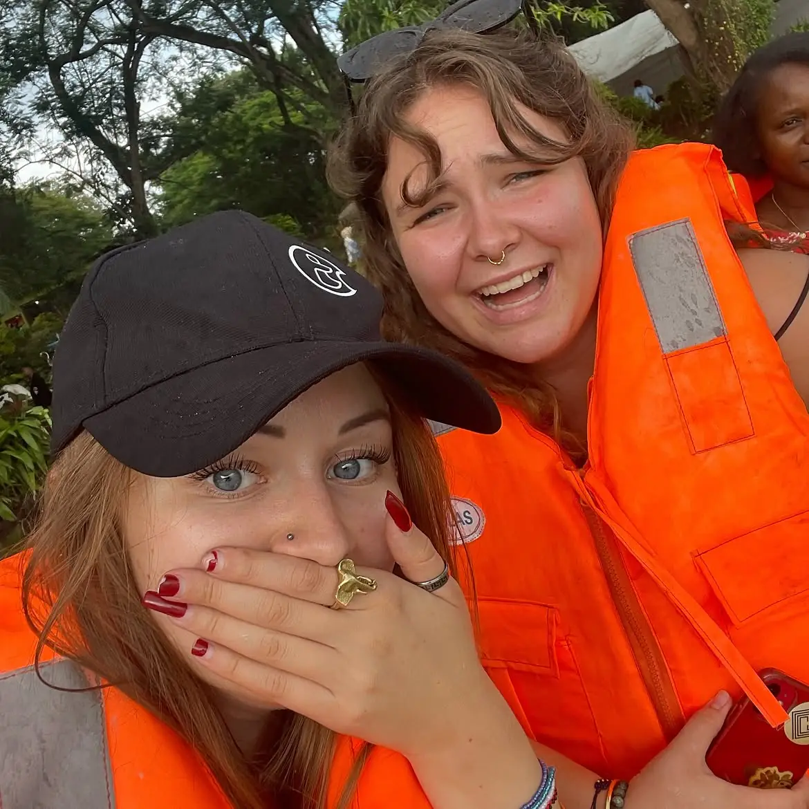 Guests in life vests ahead of a boat trip on Lake Duluti
