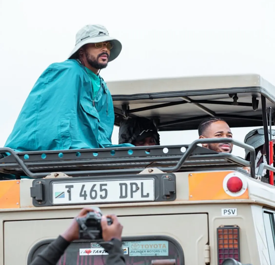 Guests popped up through the roof of a Tazan Tours safari vehicle in Arusha National Park