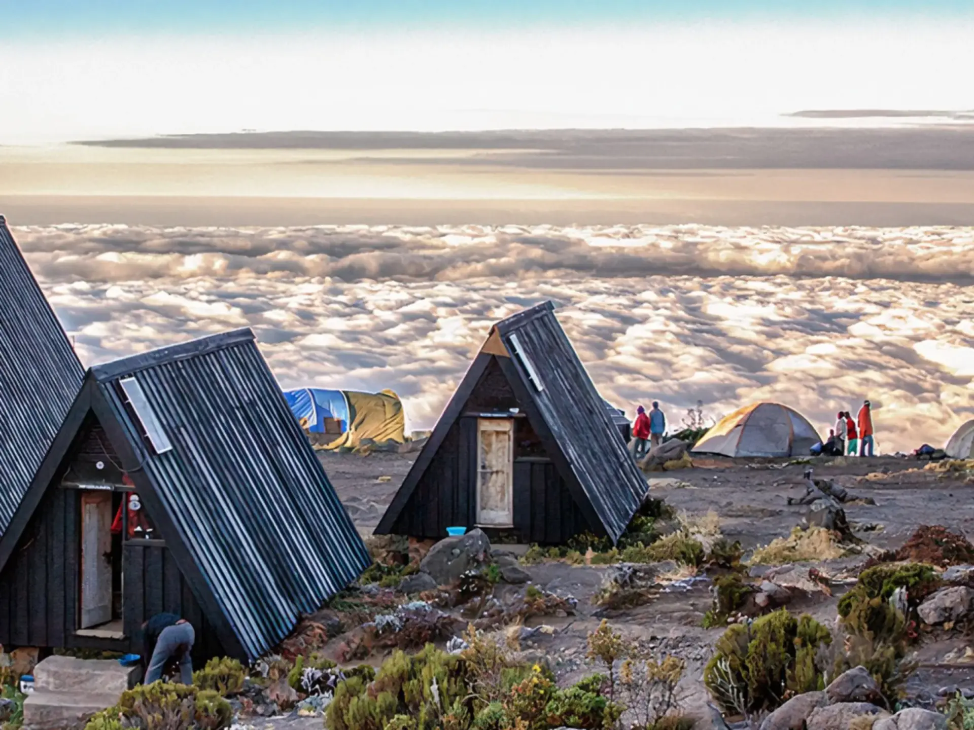 A-frame huts on the Marangu route above a sea of clouds