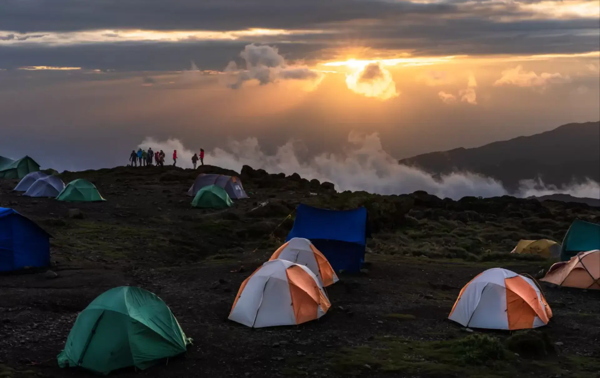 Tents at a Rongai route camp at sunset