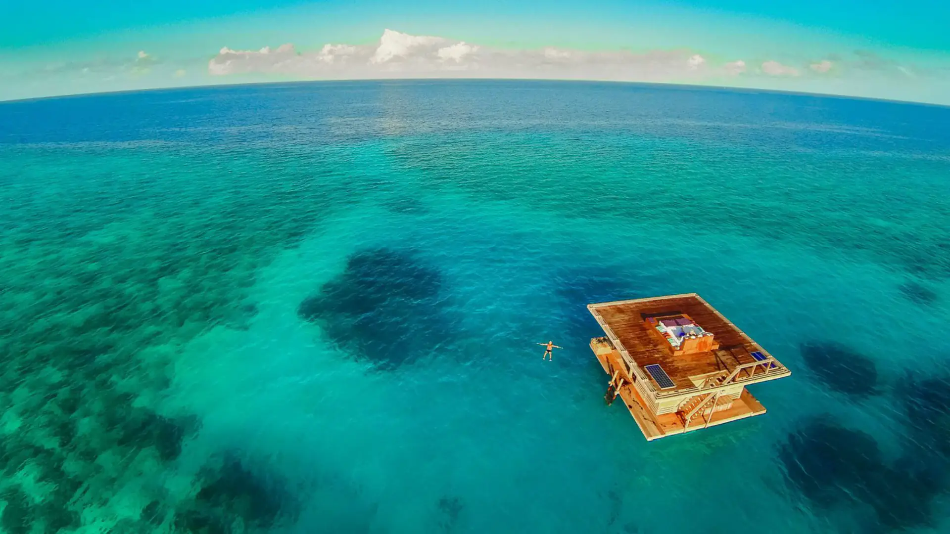 Aerial view of a floating room over the reef off Zanzibar